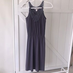 Embroidered neckline purple midi dress.